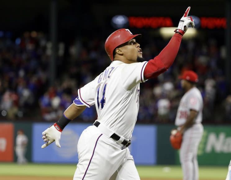 Carlos Gomez rounds the bases after completing his second career cycle with a home run. (AP)