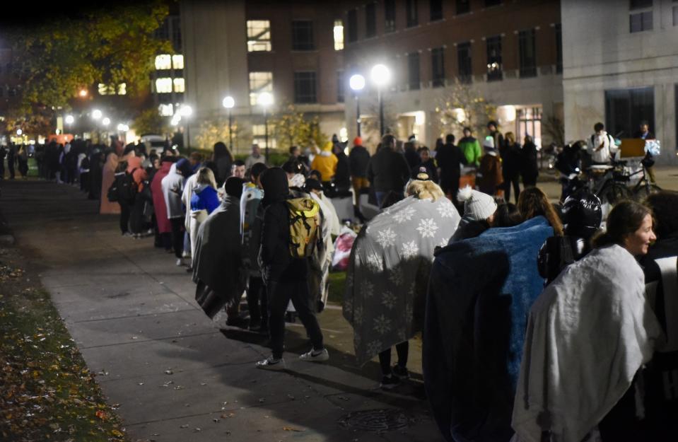 Hundreds of University of Michigan students waited in line for hours to register to vote at the Ann Arbor city clerk's satellite office at the university's Museum of Art on Tuesday, Nov. 8, 2022. (Ryan Stanton/Ann Arbor News via AP)