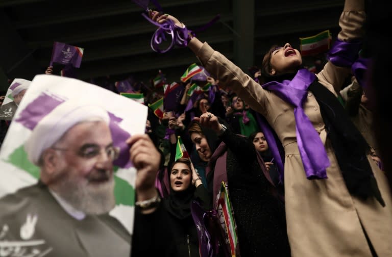 Supporters of moderate Iranian President Hassan Rouhani, who won a resounding re-election victory, attend a campaign rally in the northwestern city of Ardabil on May 17, 2017