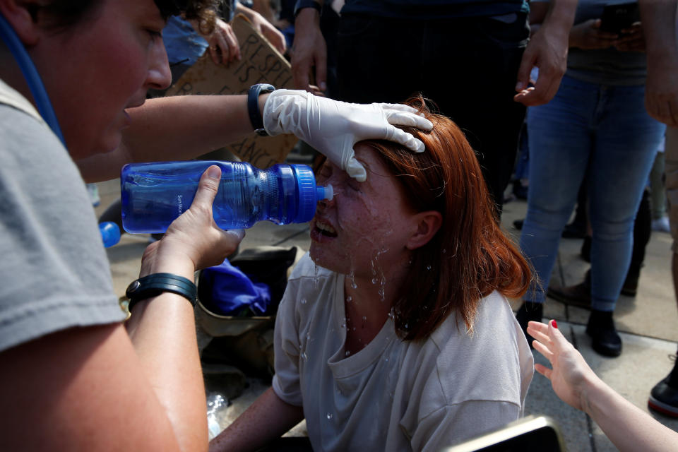 A protester receives first-aid during a clash between&nbsp;white nationalists and counter-protesters.