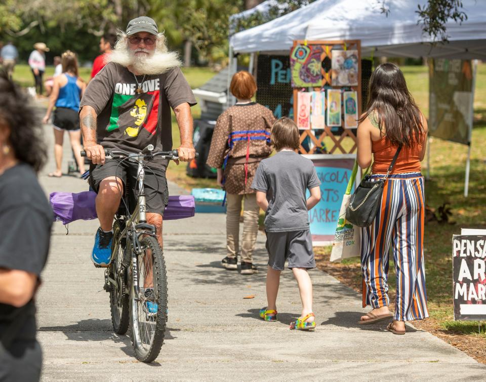 Visitors check out the festivities during a previous Earth Day Pensacola at Bayview Park.