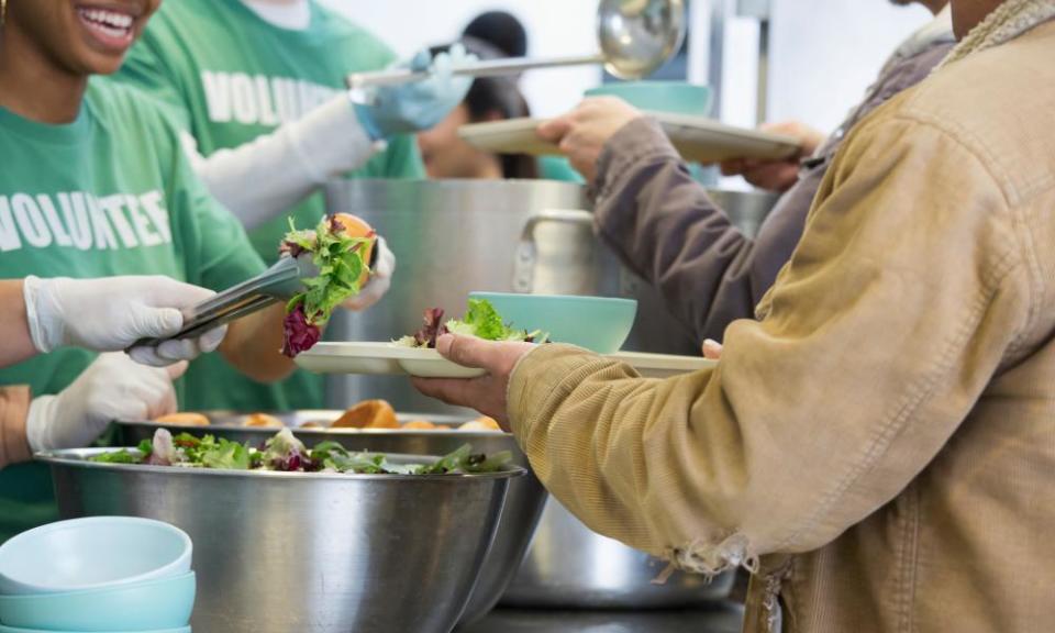 Volunteers working in soup kitchen