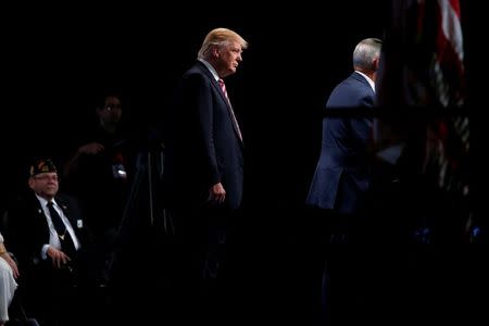 U.S. Republican presidential nominee Donald Trump speaks to the Veterans of Foreign Wars conference at a campaign event in Charlotte, North Carolina, U.S. July 26, 2016. REUTERS/Carlo Allegri