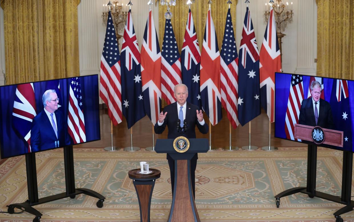 President Joe Biden delivers remarks about a national security initiative in the East Room of the White House in Washington, with Australian Prime Minister Scott Morrison and British Prime Minister Boris Johnson - Oliver Contreras