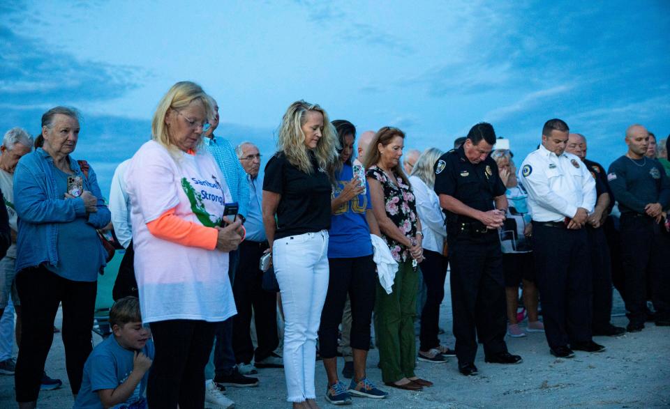 Sanibel residents, part time residents, elected officials and others commemorate the one year anniversary of Hurricane Ian at the Lighthouse Park on Sanibel on Thursday, Sept. 28, 2023.