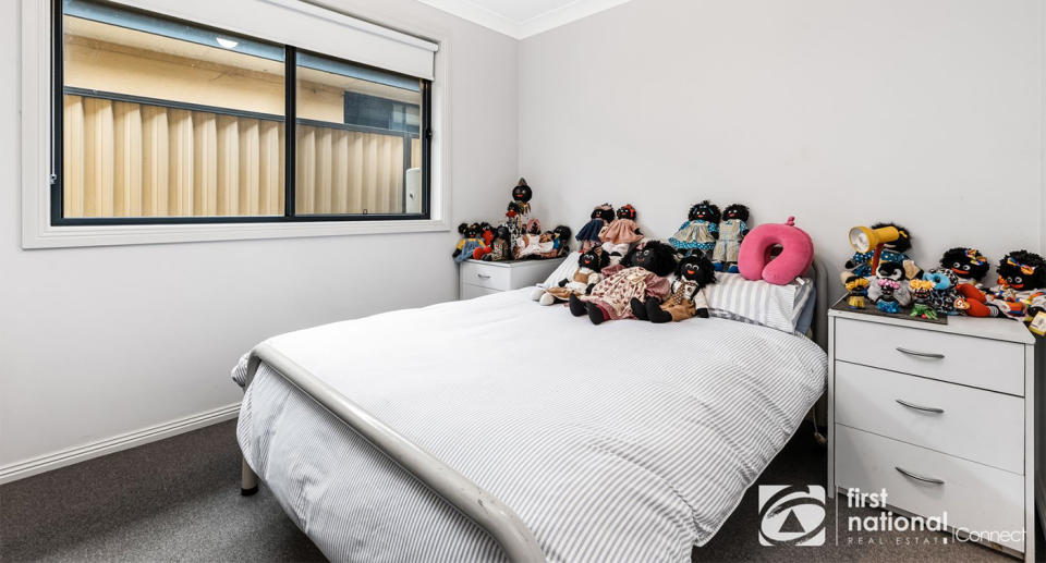 At least 17 golliwogs can be seen in a bedroom of a NSW property for sale