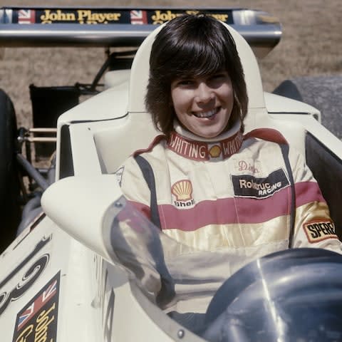 Divina Galica in her Surtees TS16 Ford Cosworth V8 before the start of the British Grand Prix in 1976 at Brands Hatch - Credit: Hulton Archive