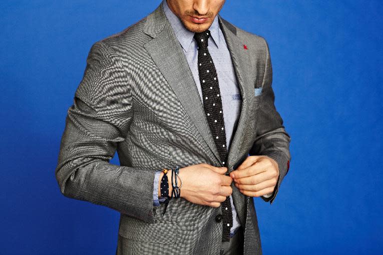 In this undated image released by Park & Bond, a model is shown wearing a suit. Fashion insiders say men are taking a keen interest in how they dress _ and that means developing their own shopping habits. You now see men dressing for the life they want to lead and image they want to project, agrees Eric Jennings, vice president and fashion director of menswear for Saks Fifth Avenue. Shopping and, even worse, trying things on to ensure a proper fit are necessary evils to get there. (AP Photo/www.parkandbond.com)