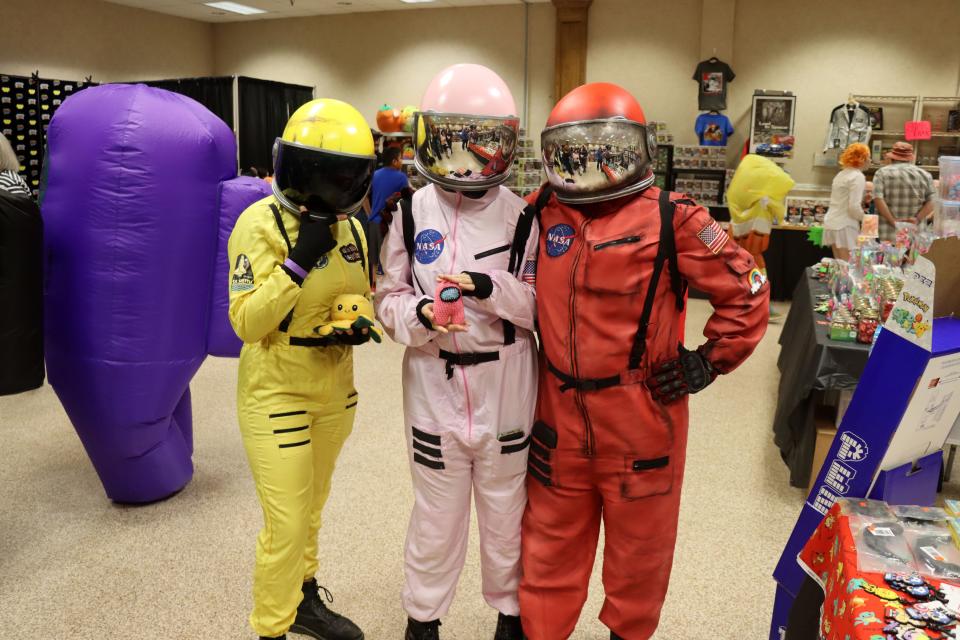 Katt Martinez, Fenn Logue and Cedes Logue show off their handmade costumes at the Amarillo Super Mini-Con at the Amarillo Civic Center in this 2022 file photo.