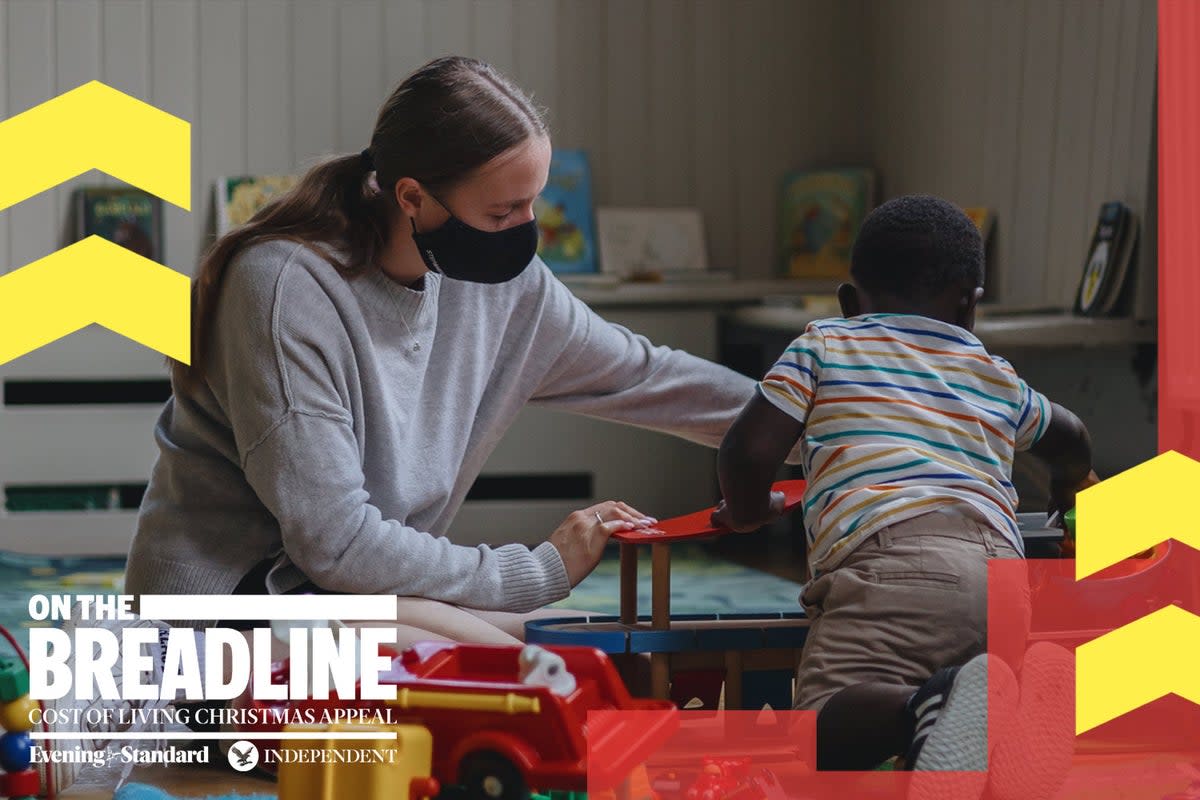 Pictured is a worker at a group which gives families the chance to cook, eat, play and learn together (ES Composite)