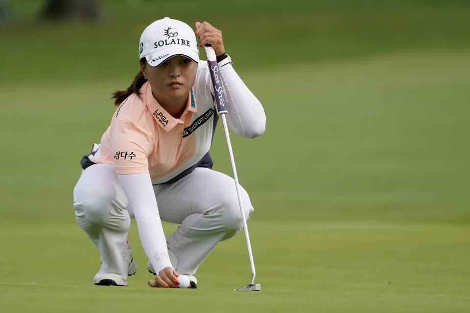 Jin Young Ko, of South Korea, sets up her shot on the 10th green in the second round of the Cognizant Founders Cup LPGA golf tournament, Friday, Oct. 8, 2021, in West Caldwell, N.J. (AP Photo/John Minchillo)