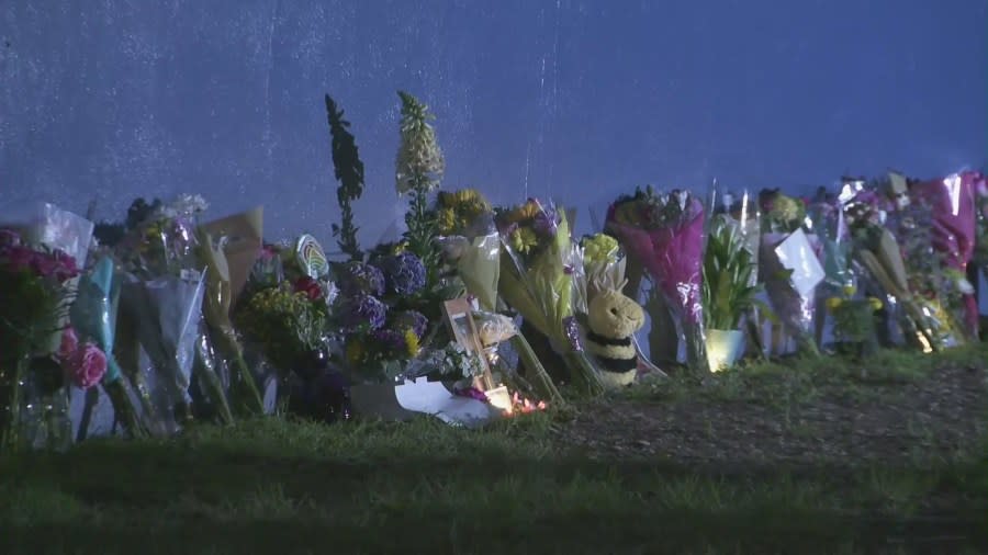 A growing memorial remembering Karyn Lombardo is seen outside Bret Harte Elementary School can be seen on May 8, 2024. (KTLA)