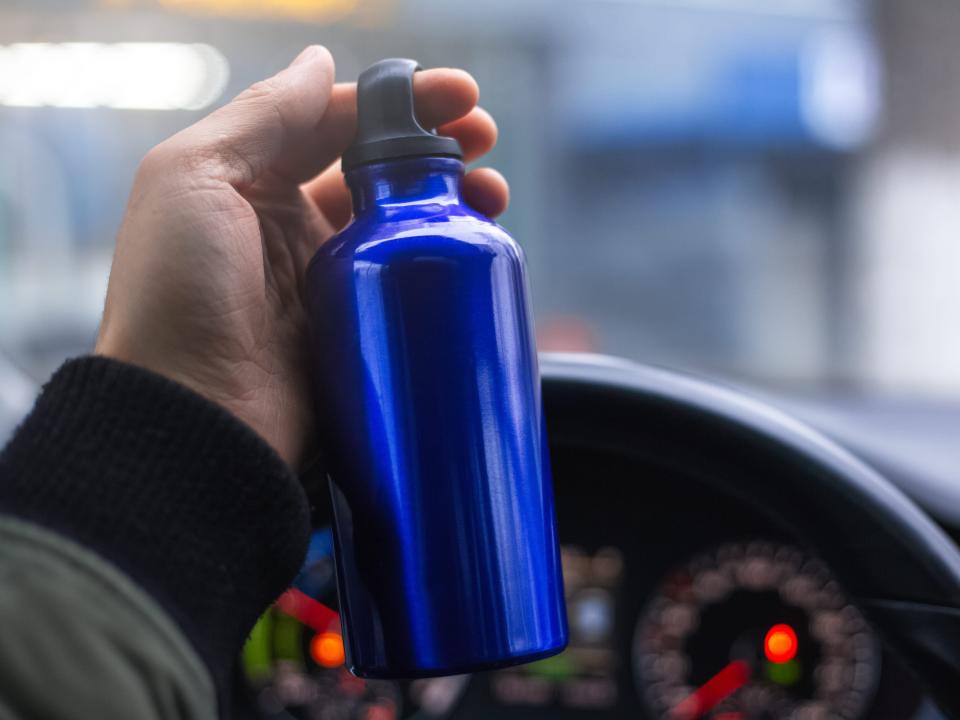 stainless steel water bottle in the car