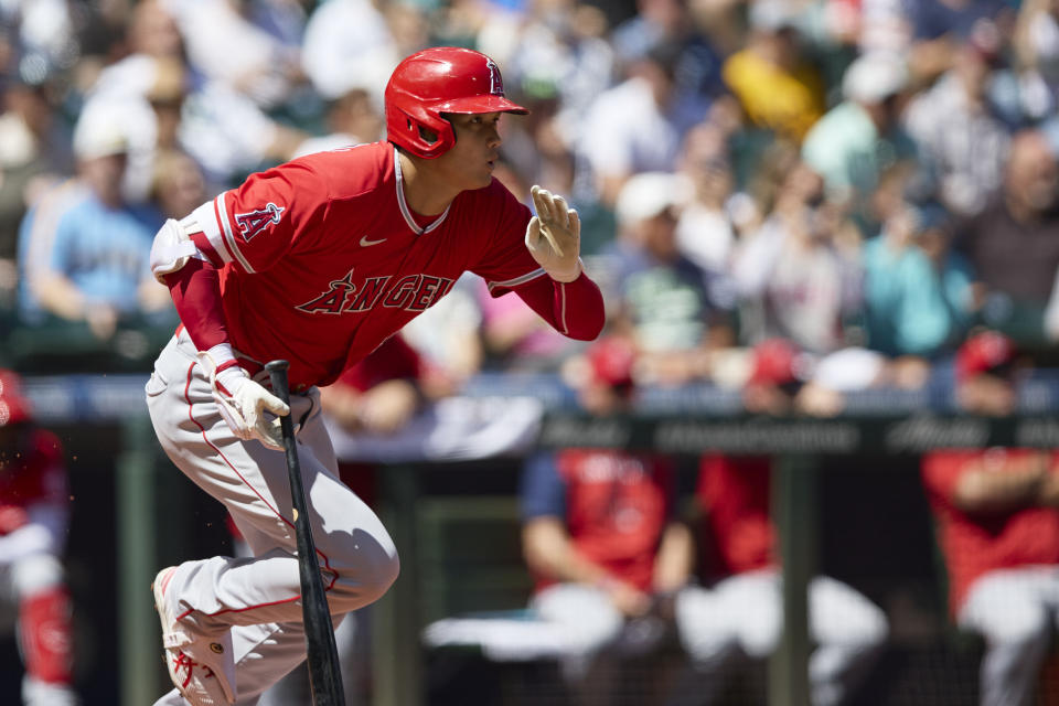 Los Angeles Angels designated hitter Shohei Ohtani grounds out against the Seattle Mariners during the first inning of a baseball game, Sunday, Aug. 7, 2022, in Seattle. (AP Photo/John Froschauer)