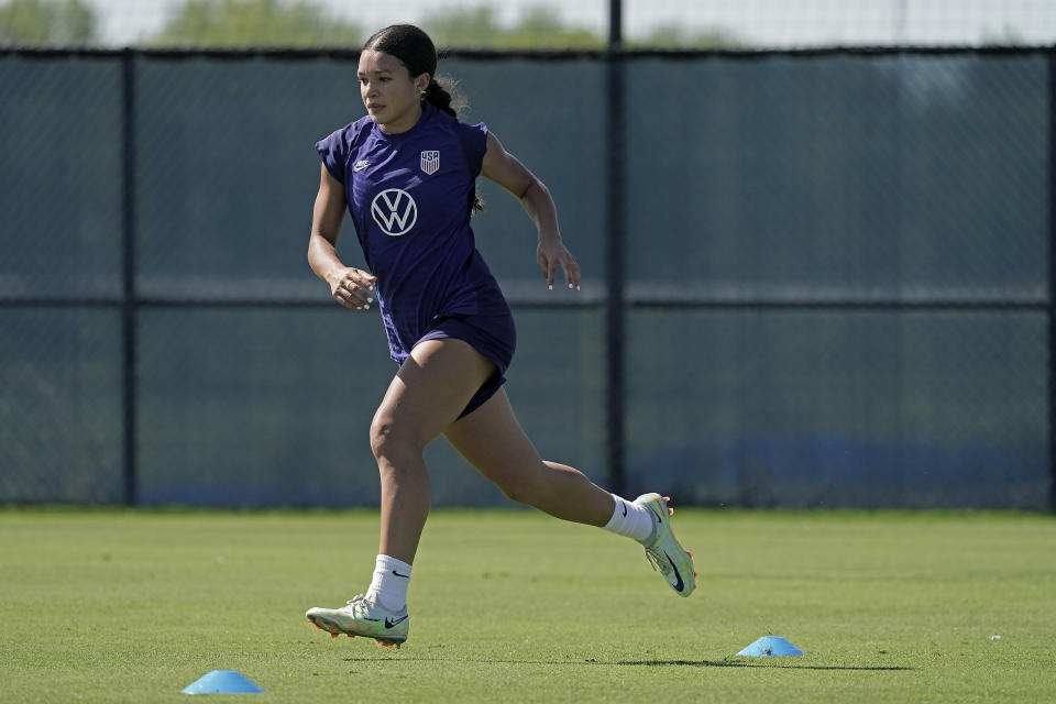 U.S. national team player Sophie Smith takes part in a drill during practice for a match against Nigeria Tuesday, Aug. 30, 2022, in Riverside, Mo. Women’s soccer in the United States has struggled with diversity, starting with a pay-to-play model that can exclude talented kids from communities of color. (AP Photo/Charlie Riedel)