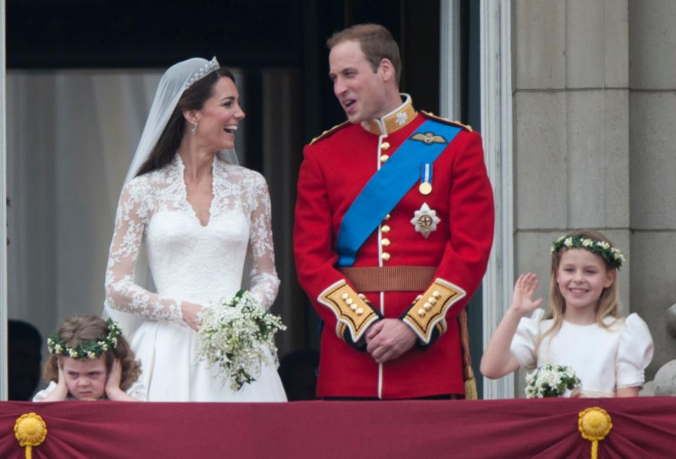 The newlyweds sharing a moment on the balcony of Buckingham Palace following their wedding at Westminster Abbey on April 29, 2011, in London. (Photo: Mark Cuthbert via Getty Images)