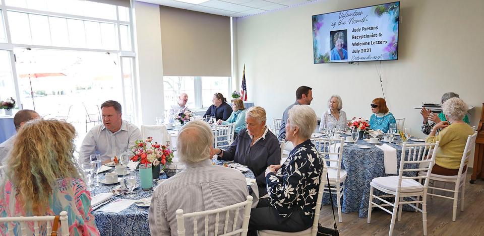 Tables of Hingham senior center volunteers at a luncheon in their honor Tuesday, April 11, 2023.