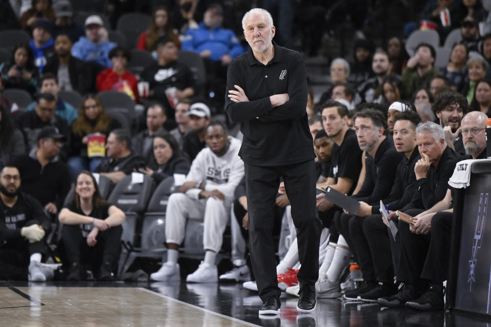San Antonio Spurs coach Gregg Popovich watches play during the first half of the team's NBA basketball game against the Minnesota Timberwolves, Saturday, Jan. 27, 2024, in San Antonio. (AP Photo/Darren Abate)