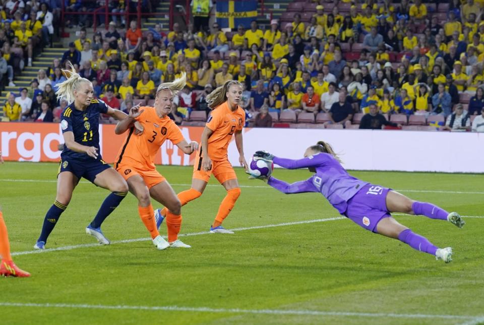 Daphne van Domselaar, right, dives to cut out Johanna Rytting Kaneryd’s cross (Danny Lawson/PA) (PA Wire)