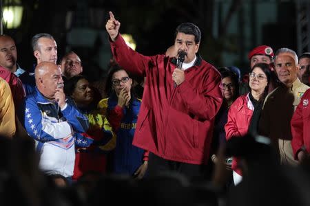 Venezuela's President Nicolas Maduro (C) speaks during a meeting with supporters in Caracas, Venezuela July 30, 2017. Picture taken July 30, 2017. Miraflores Palace/Handout via REUTERS