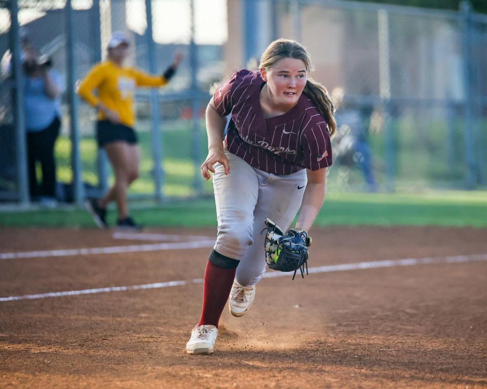 Bastrop third baseman Bailey Merritt, scooping a grounder during a playoff game against Anderson, aspires to play college softball and play for the U.S. Olympic team.
