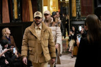 A model wears a creation as part of the men's Billionaire Fall-Winter 2024-2025 collection, that was presented in Milan, Italy, Friday, Jan. 12, 2024. (AP Photo/Antonio Calanni).