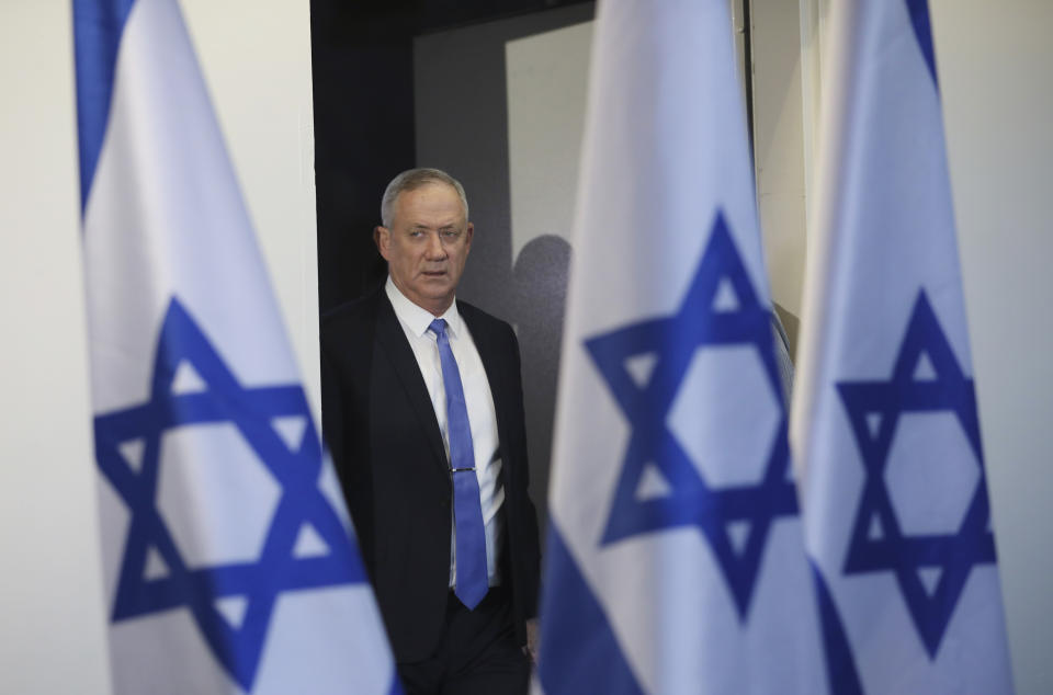 FILE - In this Nov. 20, 2019, file photo, Blue and White party leader Benny Gantz arrives to address media in Tel Aviv, Israel. President Donald Trump is holding back-to-back meetings with Israeli Prime Minister Benjamin Netanyahu and his chief challenger ahead of the unveiling of the U.S. administration's much-anticipated plan to resolve the Israeli-Palestinian conflict. The meetings come just a month before Netanyahu and Benny Gantz are set to face off in national elections for the third time in less than a year. (AP Photo/Oded Balilty, File)