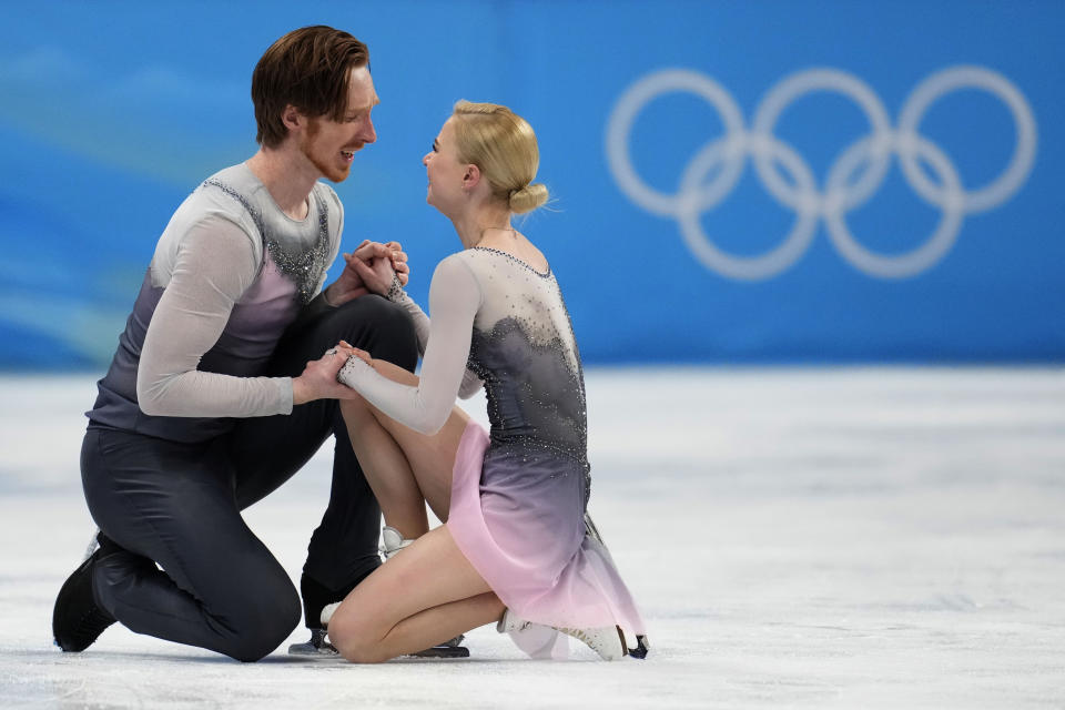 Evgenia Tarasova and Vladimir Morozov, of the Russian Olympic Committee, compete in the pairs free skate program during the figure skating competition at the 2022 Winter Olympics, Saturday, Feb. 19, 2022, in Beijing. (AP Photo/Natacha Pisarenko)