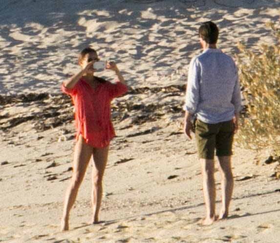 James stood on the idyllic beach as Pippa snapped her new husband.