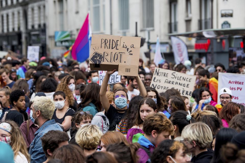 General view of the start of the annual Gay Pride march in Paris, France, Saturday, July 4, 2020. (AP Photo/Benjamin Girette)