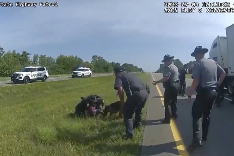 This image taken from Ohio State Highway Patrol body camera video shows a police dog attacking Jadarrius Rose, 23, of Memphis, Tenn., on July 4, 2023, in Circleville, Ohio. (Ohio State Highway Patrol via AP, File)
