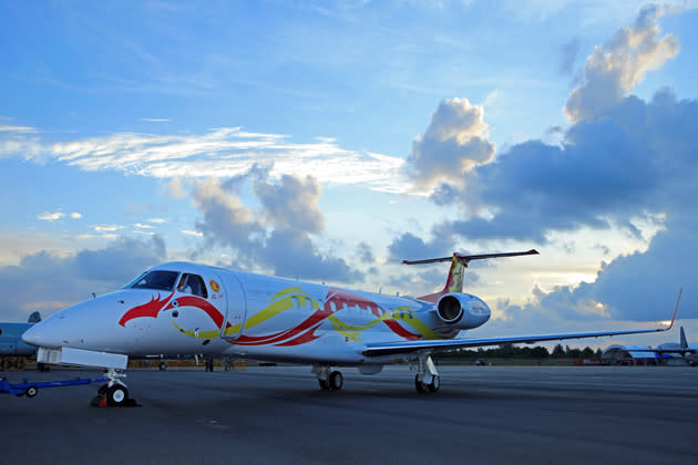 The Embraer Legacy 650 has a range of 3,900 nautical miles, allowing for non-stop flights from Beijing to Dubai, and from Hong Kong to Adelaide. Here it is shown taxiing into Singapore's Changi Exhibition Centre for this year's Singapore Airshow. (Photo courtesy of Embraer)