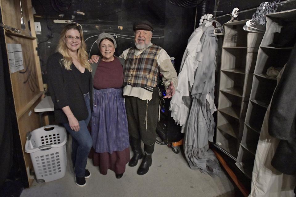 Director Jessica Booth, left, is shown with her parents, Lisa Valdiani Booth and Tod Booth, backstage before the start of Wednesday evening's dress rehearsal of "Fiddler on the Roof." Tod Booth and Lisa Valdiani Booth play the musical's lead roles of Tevye and Golde.