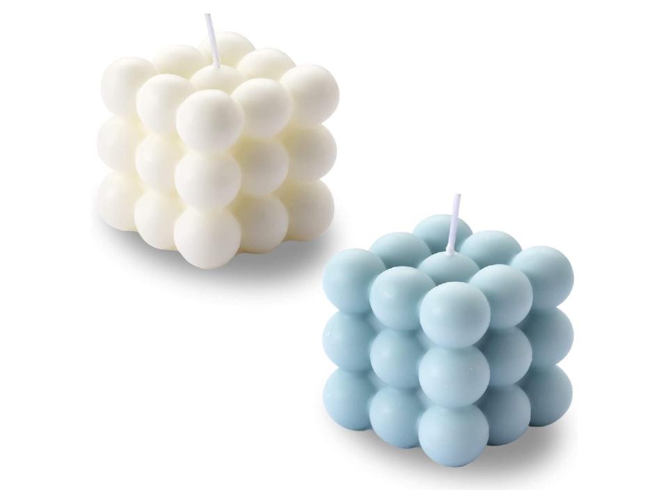 With a floral scent and sparkling design, these candles are simple and unique.  (Source: Amazon)