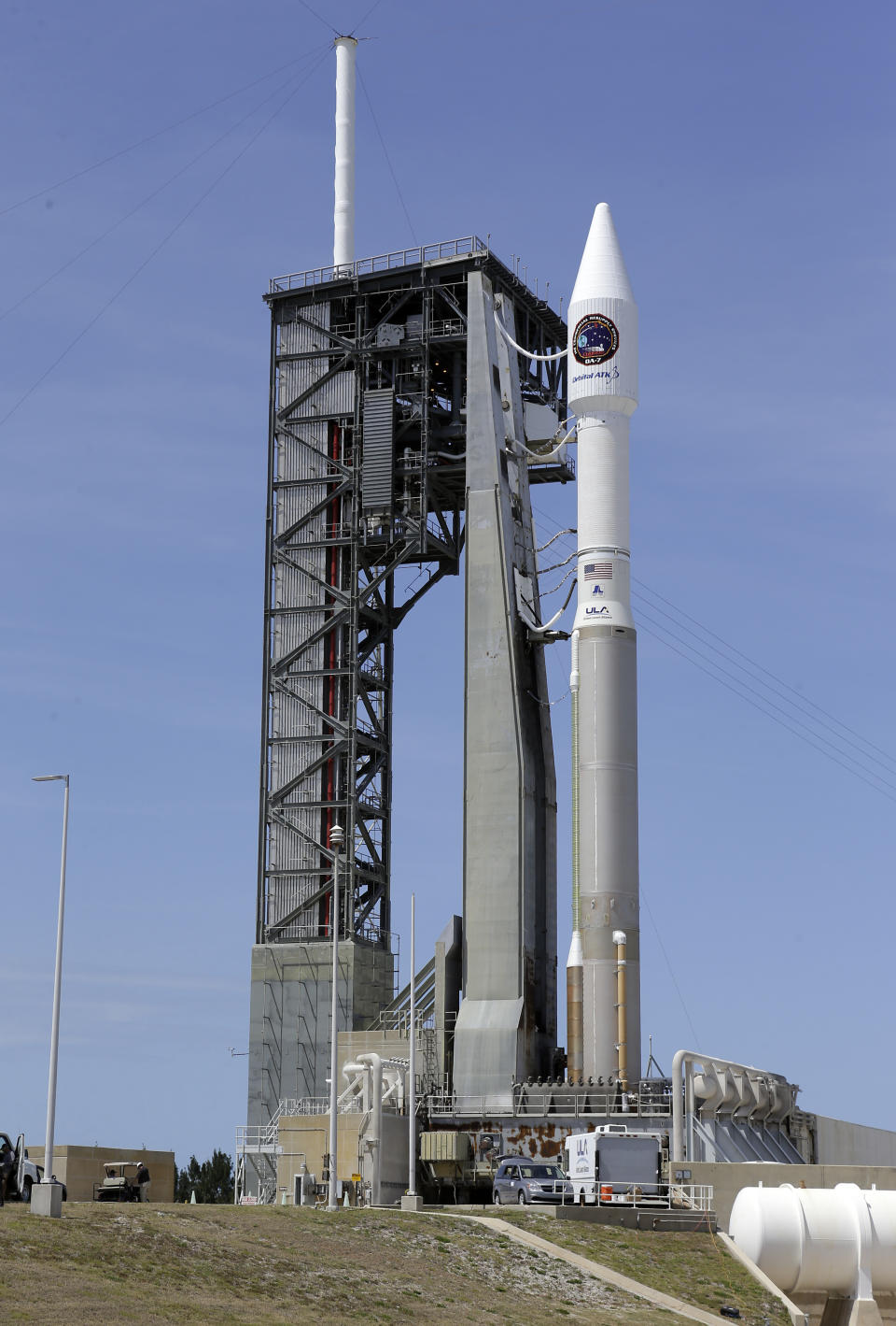 A United Launch Alliance Atlas V rocket that will carry supplies to the International Space Station stands ready at complex 41 at the Cape Canaveral Air Force Station, Monday, April 17, 2017, in Cape Canaveral, Fla. The launch is scheduled for Tuesday morning and for the first time, NASA cameras will provide live 360-degree video of the rocket heading toward space. (AP Photo/John Raoux)
