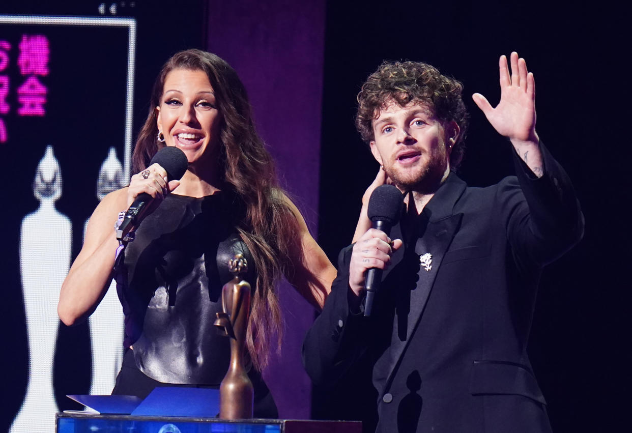 Ellie Goulding and Tom Grennan presenting an award during the Brit Awards 2023 at the O2 Arena, London. Picture date: Saturday February 11, 2023. (Photo by Ian West/PA Images via Getty Images)