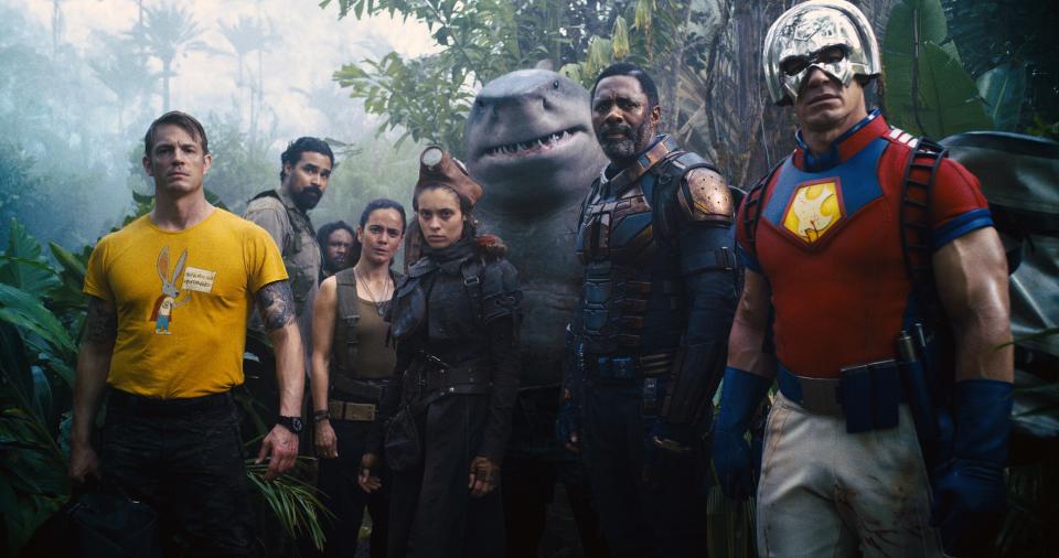 THE SUICIDE SQUAD, foreground from left: Joel Kinnaman as Rick Flag, Reinaldo Faberlle as large guerrilla, Alice Braga as Sol Soria, Daniela Melchior as Ratcatcher II, King Shark (voice: Sylvester Stallone), Idris Elba as Bloodsport, John Cena as Peacemaker, 2021. © Warner Bros. / courtesy Everett Collection