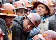 Miners attend a rally to support Bolivia's President Evo Morales in La Paz