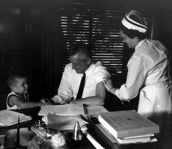 Former Florida Gov. LeRoy Collins gets a shot before an overseas trip.