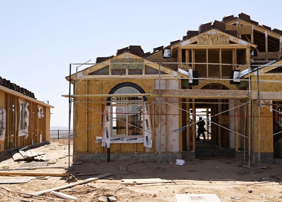 A construction worker installs windows at a new home in Sun City Mesquite, an active adult community, on April 13, 2023 in Mesquite, Nevada. (Credit: RJ Sangosti, MediaNews Group, The Denver Post via Getty Images)