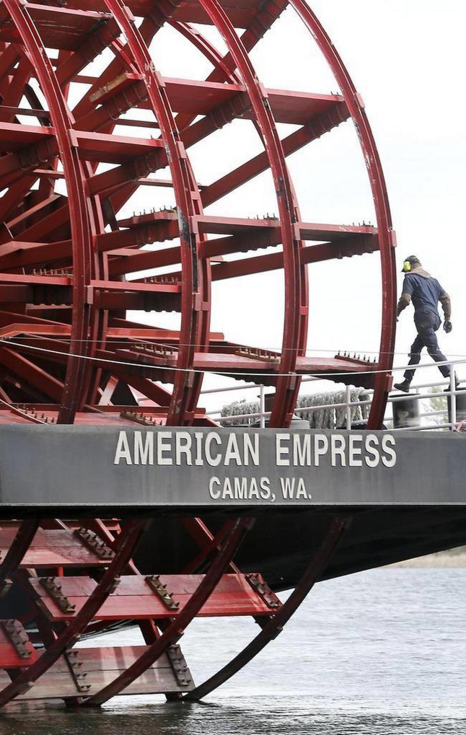 April 25, 2015 - A deck hand on the 360-foot diesel-powered paddle wheeler American Empress walks past the ship’s propulsion assembly while performing work on the vessel moored at the Lee Boulevard dock in Richland. The American Queen Steamboat Company operates the river cruise ship, billed on its website as the largest overnight riverboat west of the Mississippi River, on the Snake and Columbia rivers between Clarkston and Astoria. The company website says the ship is headed to Clarkston to begin a nine-day excursion that concludes May 3 in the Portland area. Tri-City Herald