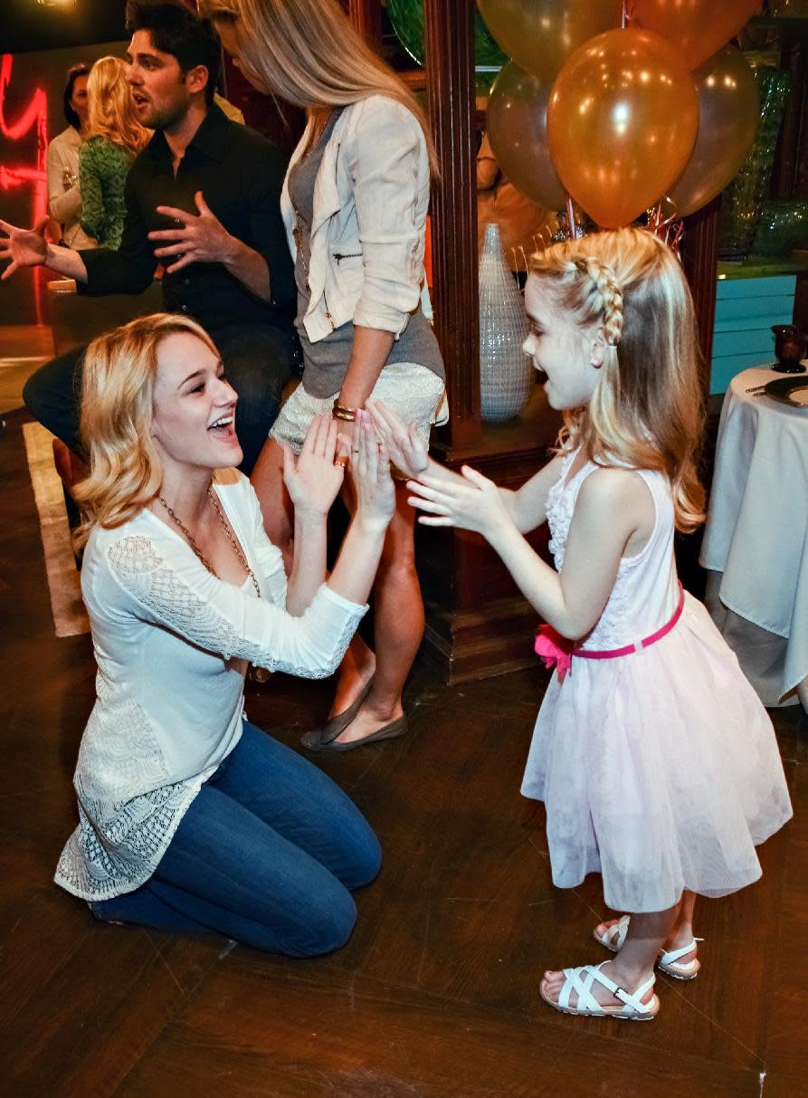 Hunter King and McKenna Grace play at "The Young and the Restless" 41st Anniversary, on Tuesday, March 25, 2014, in Los Angeles. (Photo by Tonya Wise/Invision/AP)