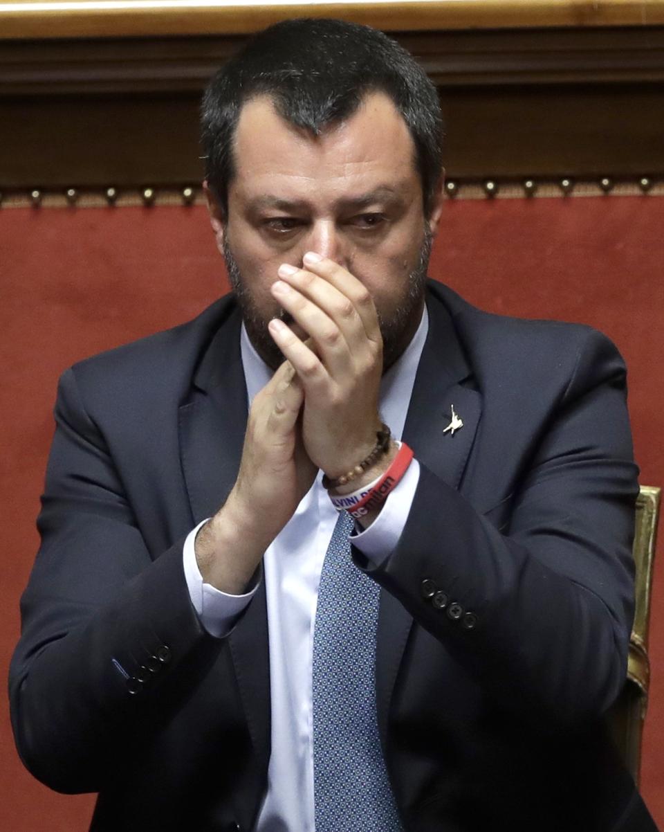 Italian Interior Minister and Vice Premier Matteo Salvini claps his hands at the Italian Senate, in Rome, Wednesday, March 20, 2019. Salvini spoke in the Senate ahead of a vote on whether to lift his immunity as a lawmaker to face possible kidnapping charges for refusing to allow some 177 migrants rescued at sea and transferred to the Italian coast guard ship Diciotti last August. (AP Photo/Alessandra Tarantino)