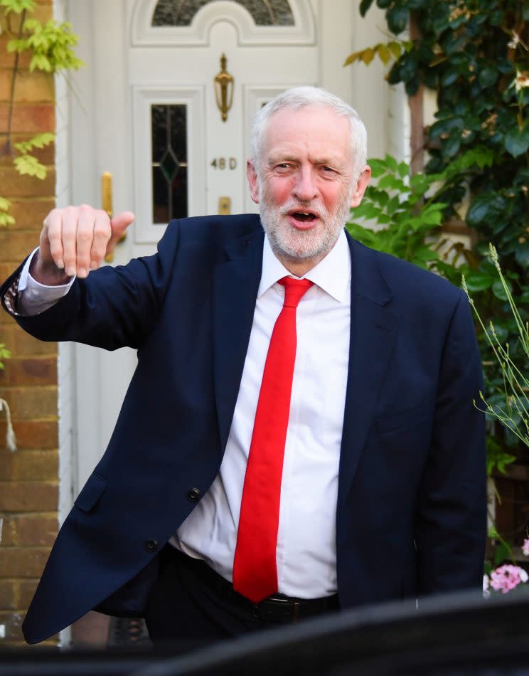 A jubilant Jeremy Corbyn leaves his London home this morning (Rex)