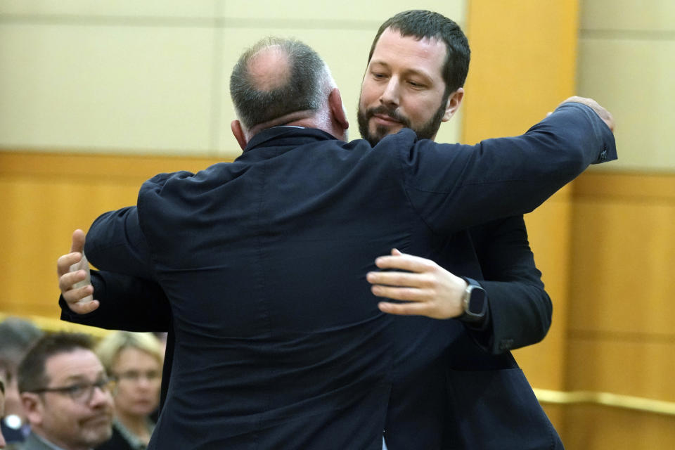 Mstyslav Chernov, journalist and filmmaker of "20 Days in Mariupol," get a hug from chef Jose Andres following a screening of the film at the State Department in Washington, Tuesday, Feb. 27, 2024. (AP Photo/Susan Walsh)