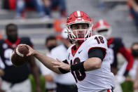 Georgia quarterback JT Daniels (18) throw a pass in the first half during Georgia's spring NCAA college football game, Saturday, April 17, 2021, in Athens, Ga. (AP Photo/John Bazemore)