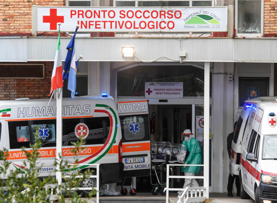 NAPLES, CAMPANIA, ITALY - 2020/03/04: Nurses carry a Coronavirus COVID-19 patient with a high bio-containment stretcher, to take him to the hospital ward where he will be treated. (Photo by Salvatore Laporta/KONTROLAB/LightRocket via Getty Images)