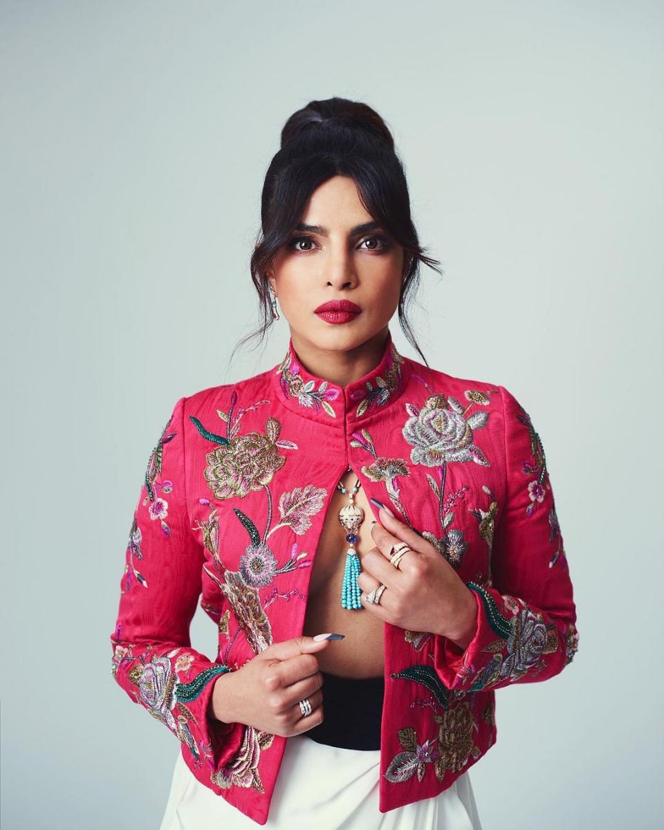 <div class="paragraphs"><p>Priyanka stuns in an embroidered red jacket with white harem pants.</p></div>