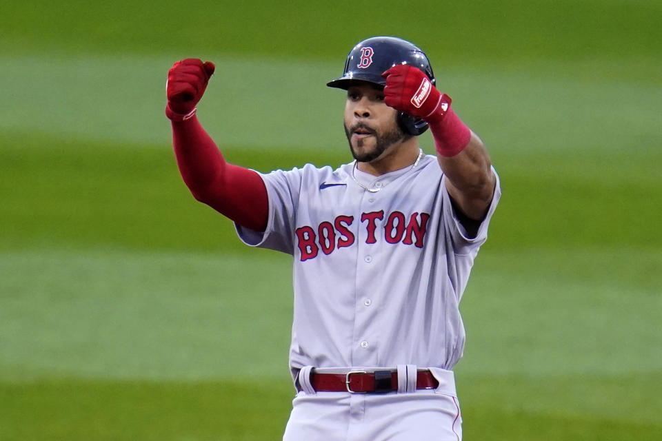 Boston Red Sox's Tommy Pham celebrates as he stands on second base after hitting a double off Boston Red Sox starting pitcher Nick Pivetta during the first inning of the MLB Little League Classic baseball game in Williamsport, Pa., Sunday, Aug. 21, 2022. (AP Photo/Gene J. Puskar)