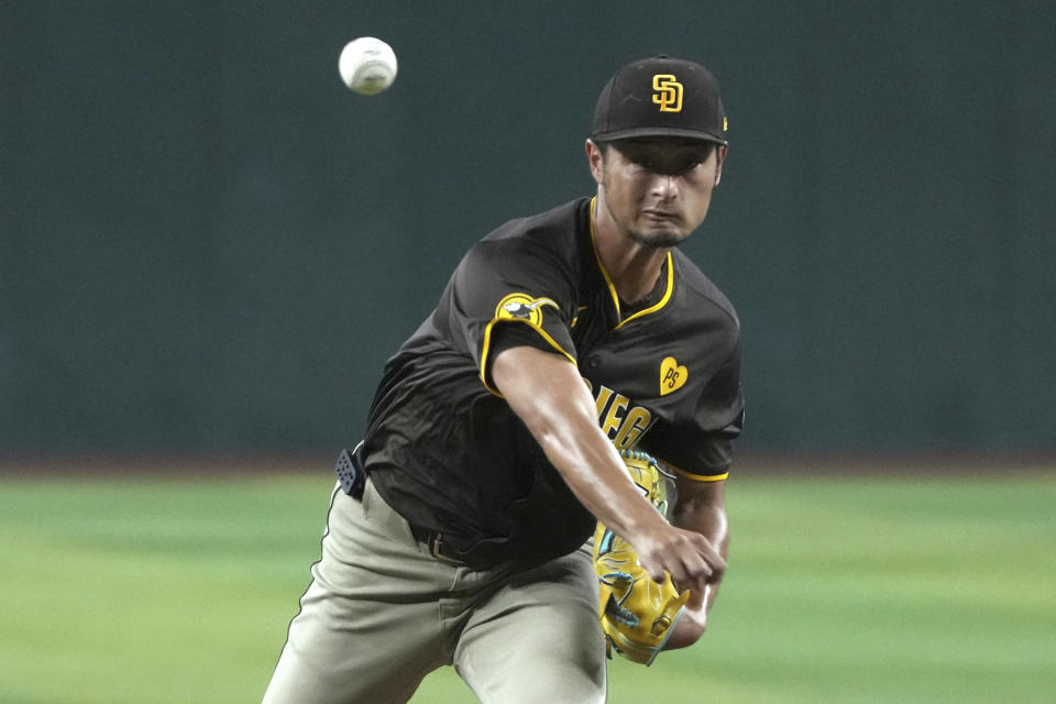 San Diego Padres pitcher Yu Darvish throws against the Arizona Diamondbacks in the first inning during a baseball game, Friday, Sept. 27, 2024, in Phoenix. (AP Photo/Rick Scuteri)